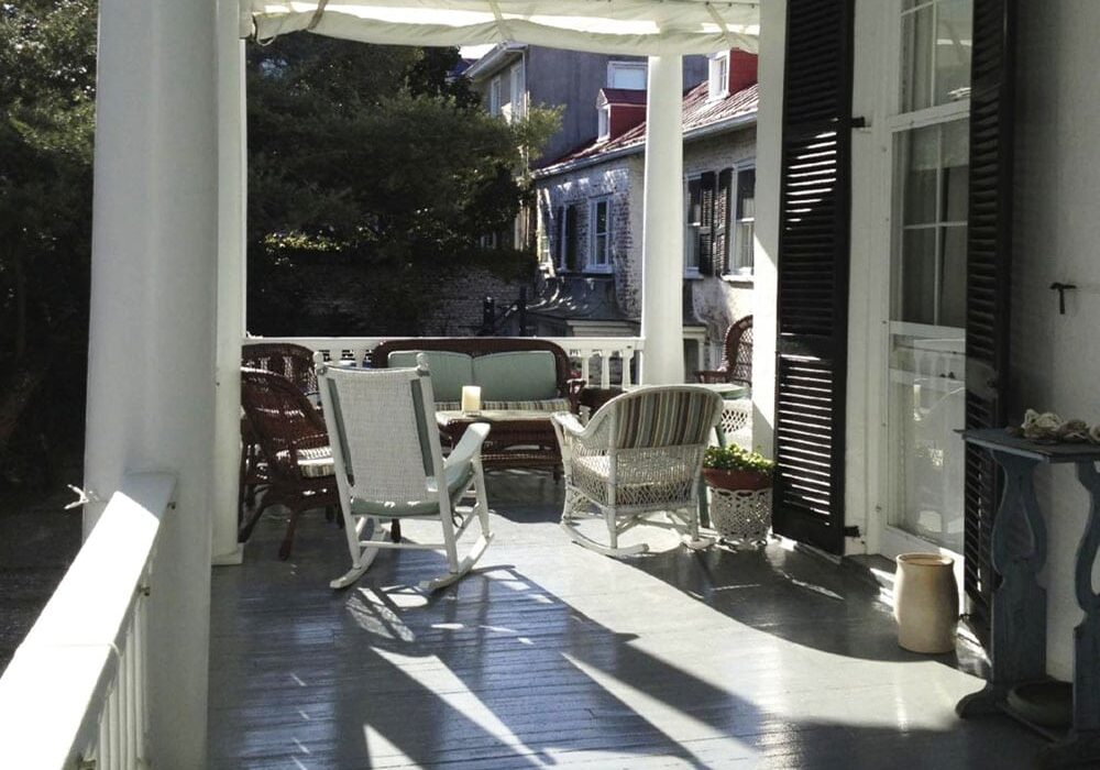 Porch sitting area at 15 Church St Bed & Breakfast in Charleston, SC